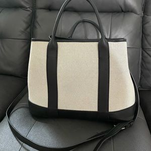 Great condition Black and Tan/ leather and cloth bag!